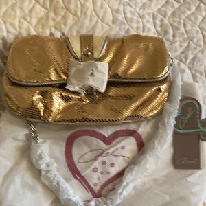 Axel New gold snakeskin clutch w/silver chain
